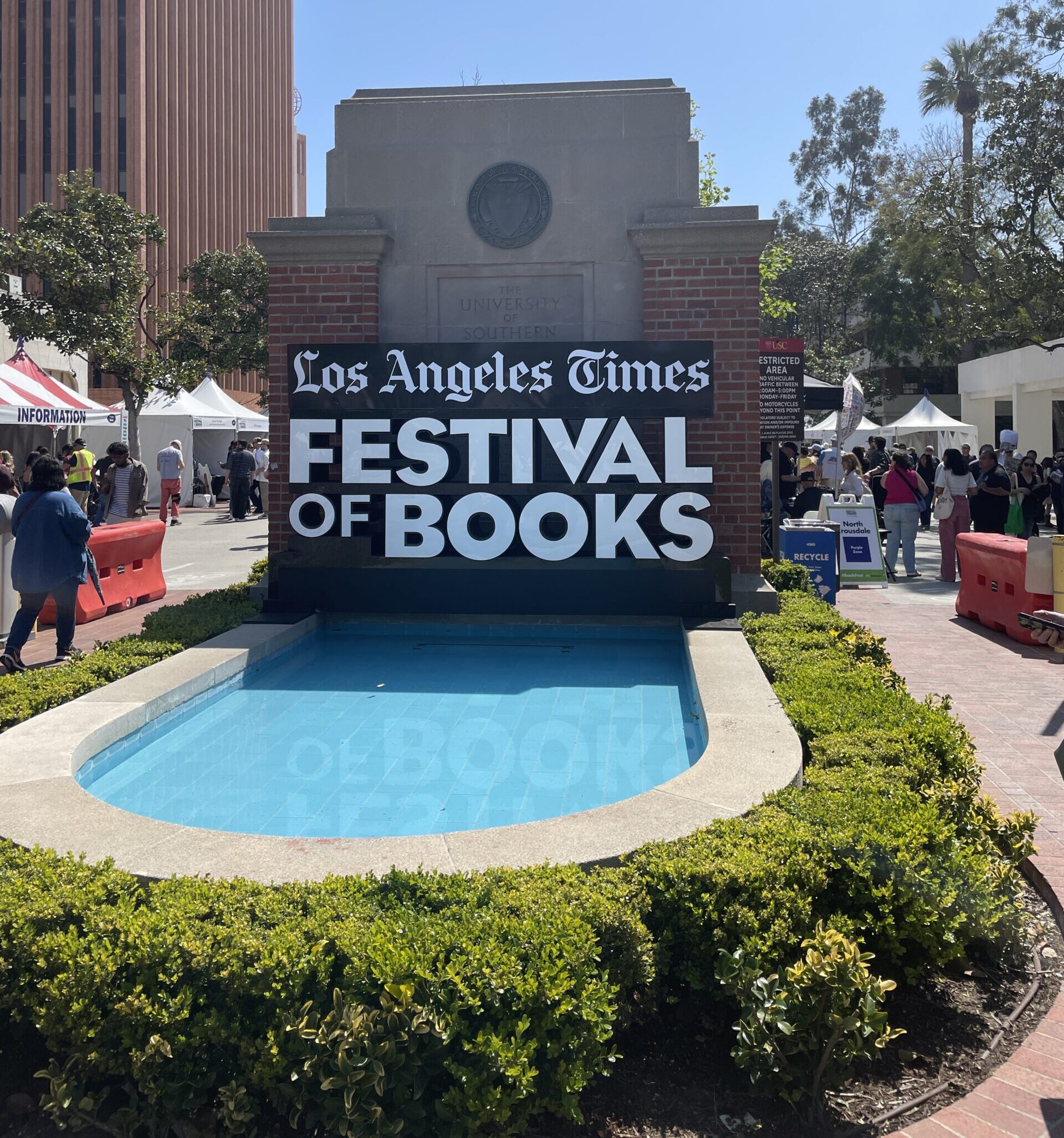 A fountain with the words "Los Angeles Times Festival of Books" over it.