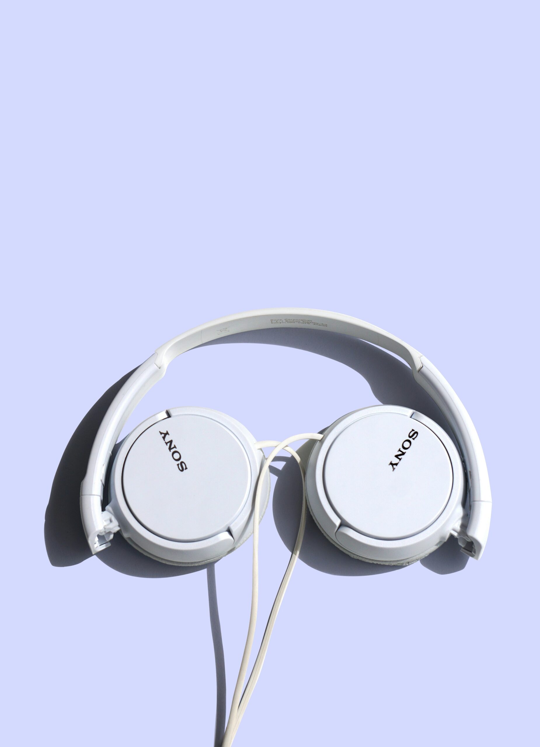 headphones on purple background